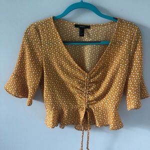 Yellow polka dot blouse